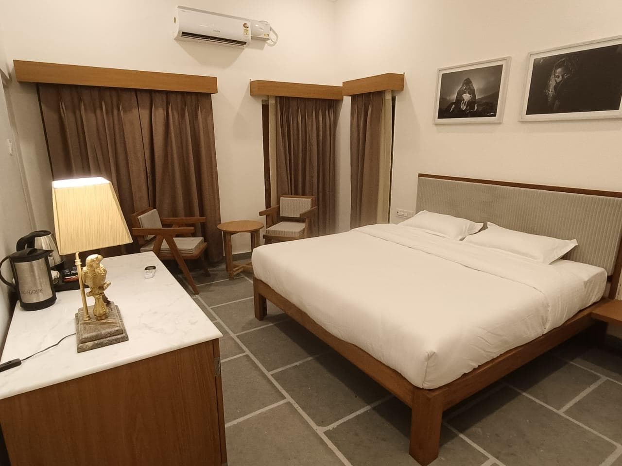The Garden Room at Shivbagh, opening onto a green planted garden